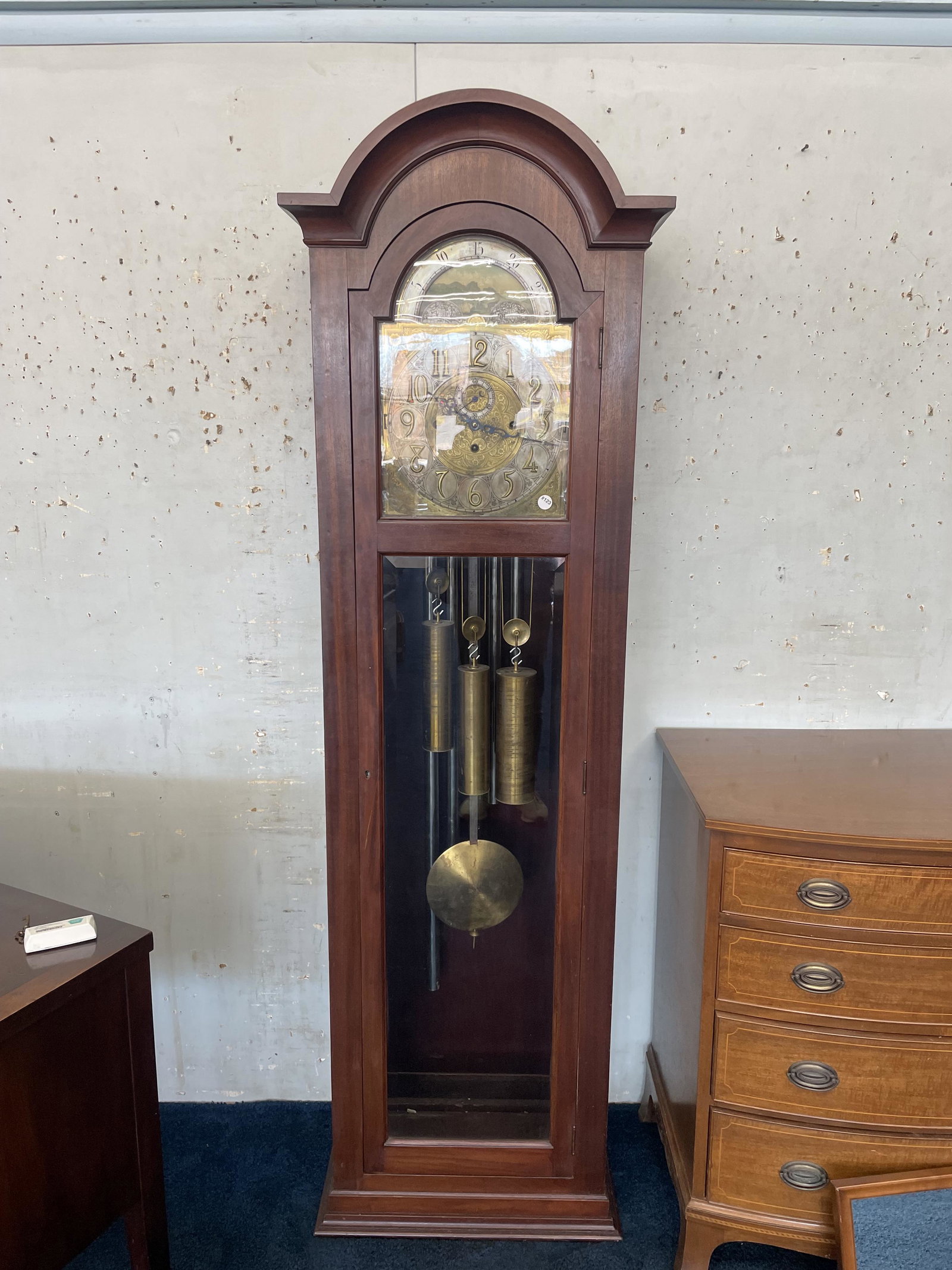 Black Forrest German Five Tube Grandfathers Clock: Signed "M. Winterhalder & Mofmeier Nehstadt, Badnbaden Germany"Measures 92" x 28". Includes five tubes, the weights, pendulum & key.