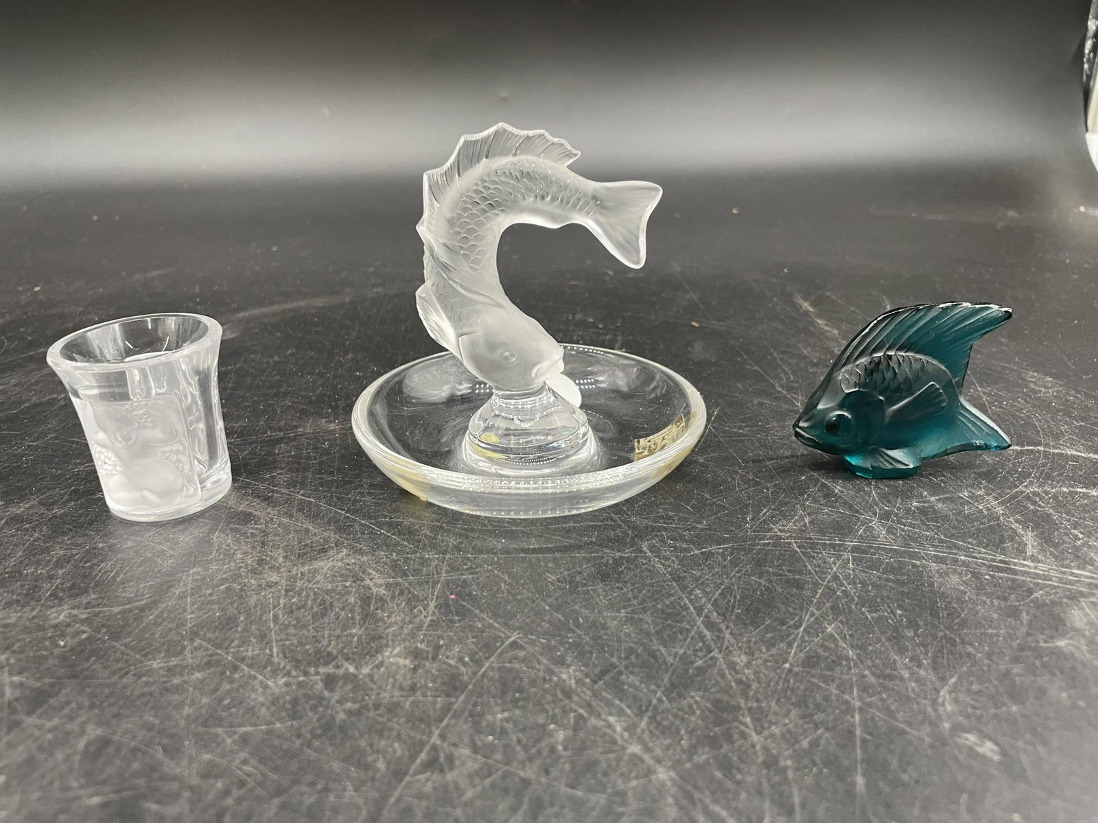 Three Pcs Lalique: lot includes shot glass, fish ring holder and small green angel fish. Largest 3"H.