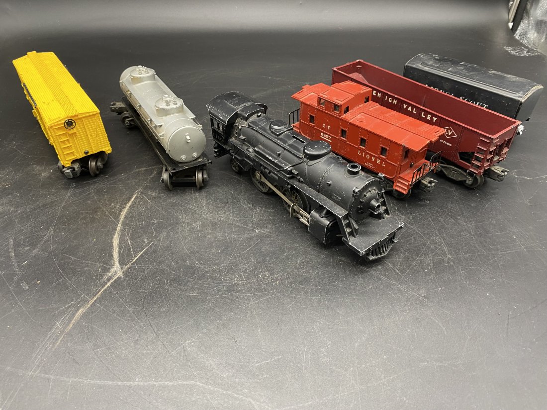 Vintage Lionel Train: Lot includes engine & five cars signed Lionel