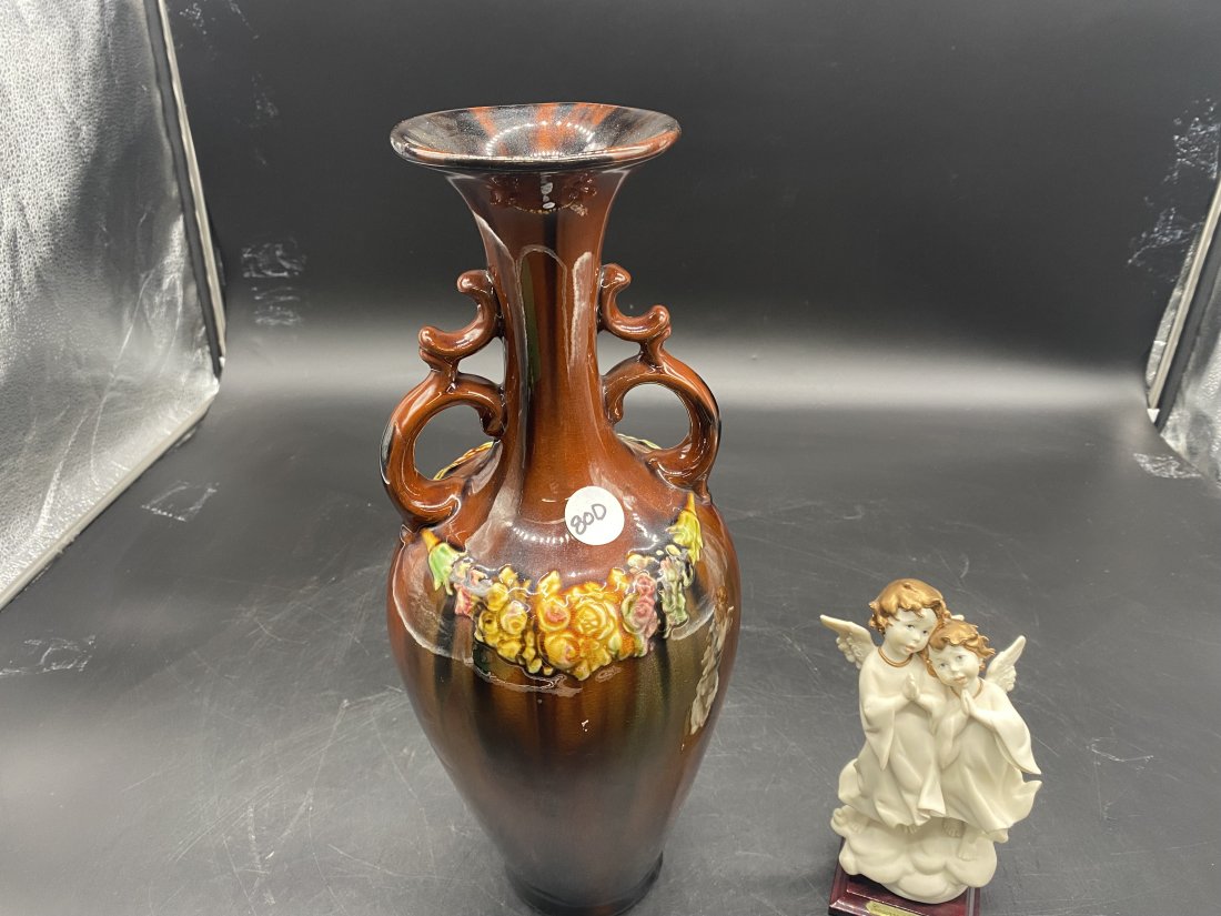 Giuseppe Armani Angel and Arts & Crafts Pottery Vase: Double angel is 8" and is signed on base and figure. Peters & Reed arts & crafts pottery vase measures 16" x 6".