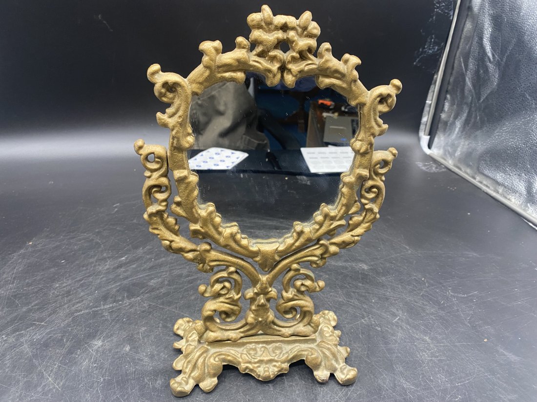 Antique Gilt Cast Metal Mirror: cast metal and measures 13"x8"