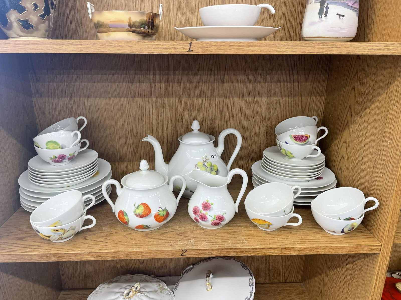 Thirty Eight Pieces French Dinnerware: Tea pot measures 8" H.