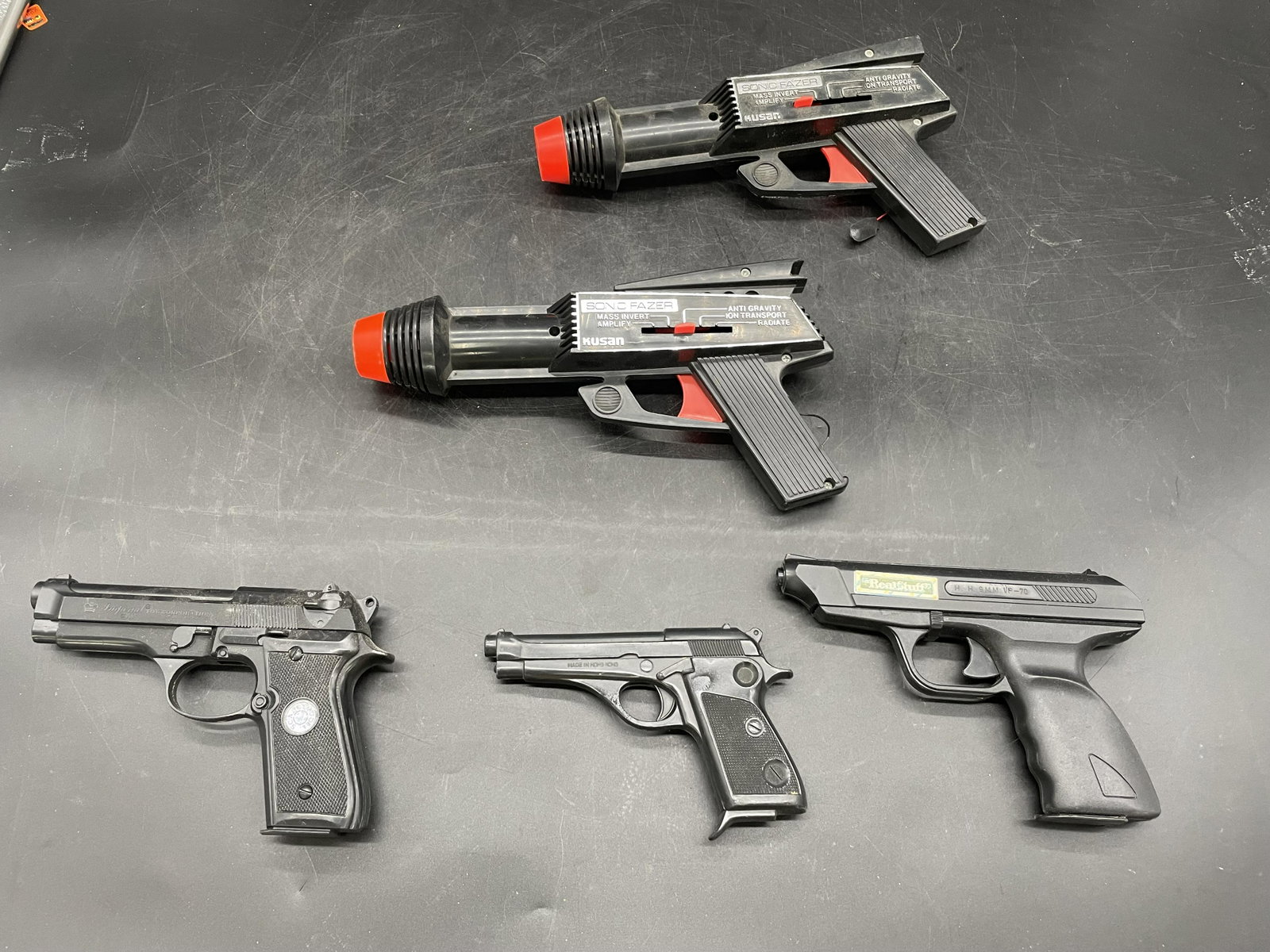 Grouping Of Plastic Toy Guns: Lot includes Sonic Fazer & other plastic toy guns.