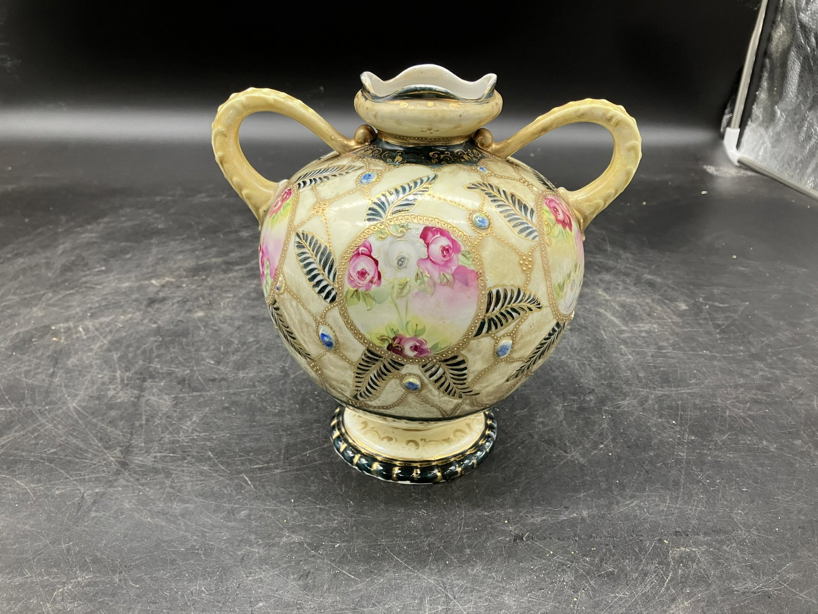 Nippon Vase: Hand painted decoration. Measures 7" H.