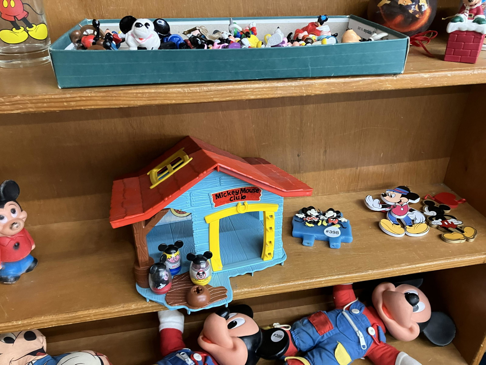 Grouping of Mickey Mouse Collectibles: Mickey Mouse clubhouse measures 8" H.