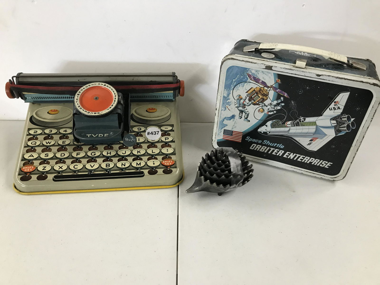 Tin Toy Lot: Includes 1947 typewriter, lunchbox. porcupine.