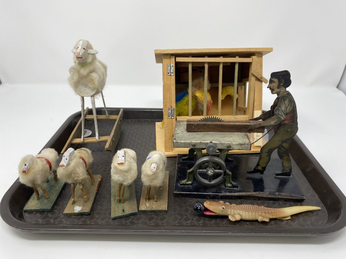 Lot Of Antique Miniatures: includes toy animals, toy table saw and German animals., black Americana alligator, Cage measures 5" x 6".
