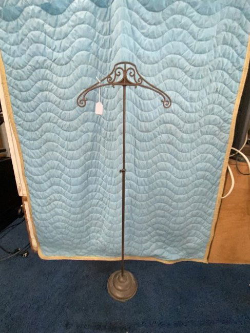 Vintage Cast Iron Valet: Measures 52" x 15". Is adjustable.