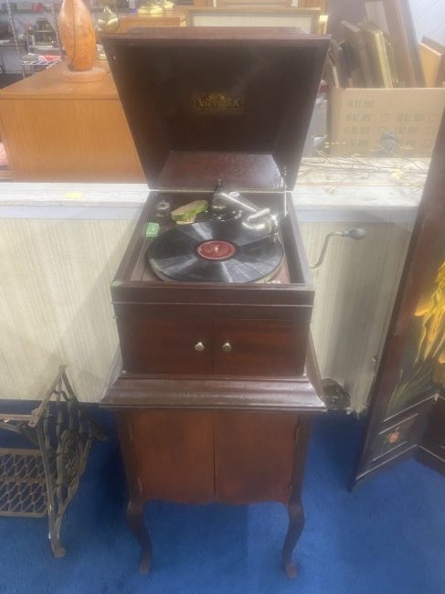 Mahogany Victor Victrola On Stand: Measures 46" x 19" x 23". Includes records & accessories.