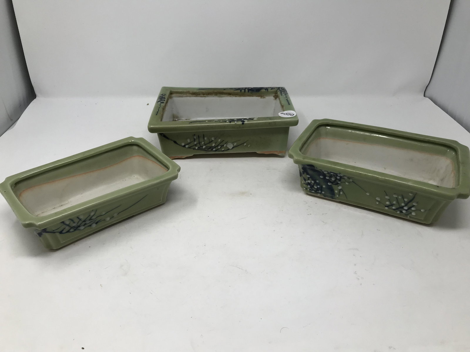 Three Chinese Celadon Planters: Largest measures 9" W.