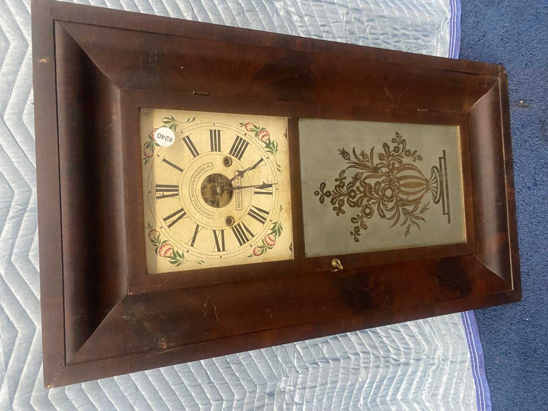 Forestville Ogee Clock: has original label, key/pendulum and weights. 31"H.