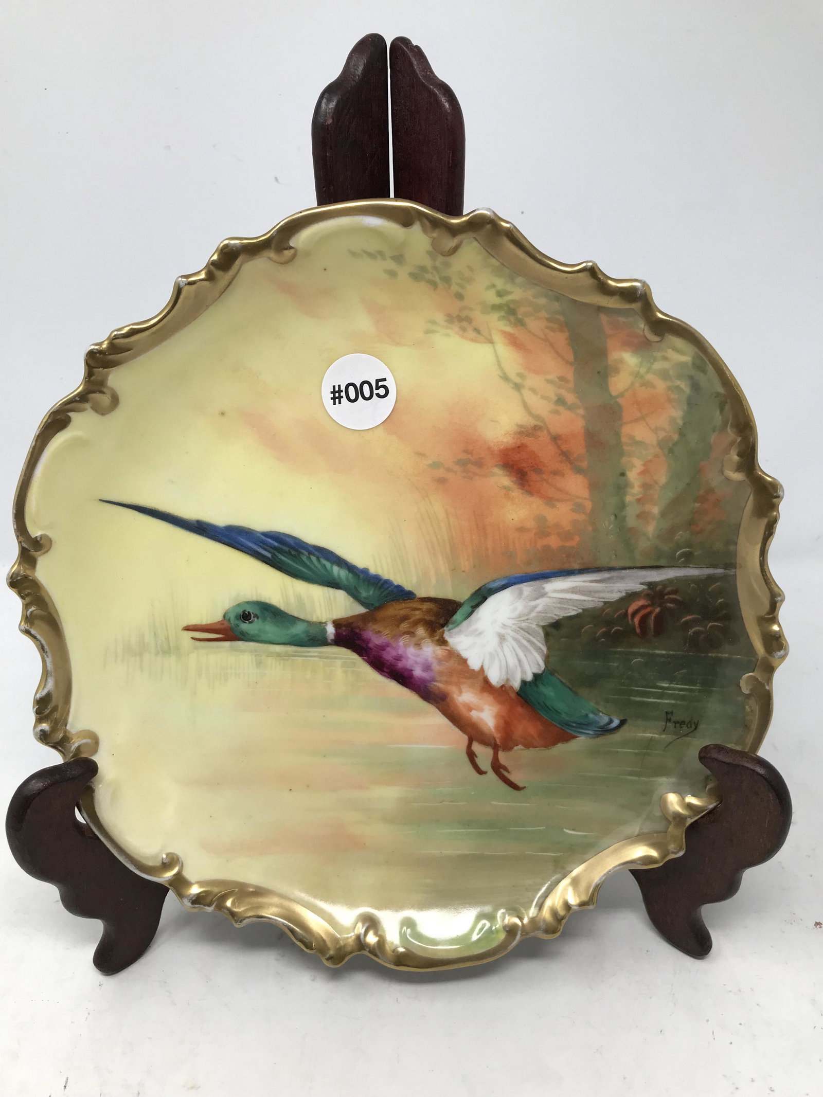 Limoges Artist Signed Charger: signed "Fredy", 10"W, marked on back.