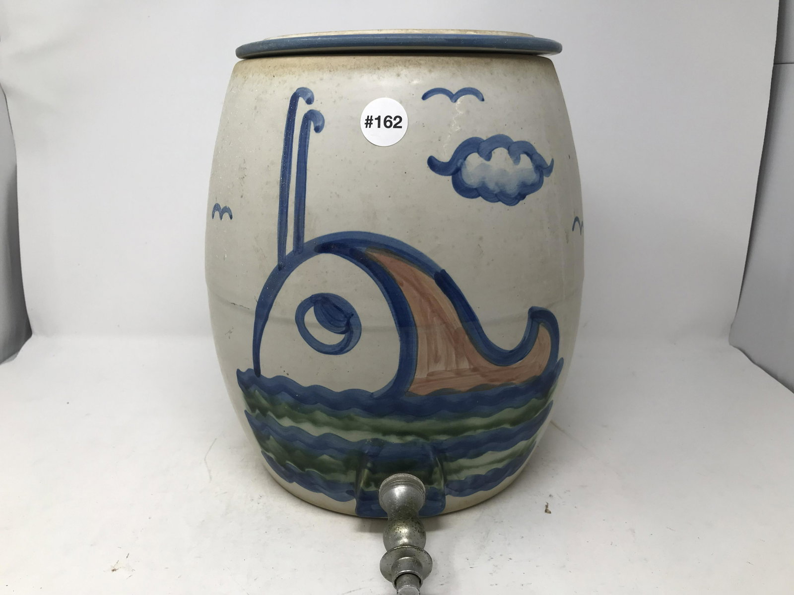 M. A. Hadley Dispenser: Measures 12" x 9". Signed on interior, includes original spout.