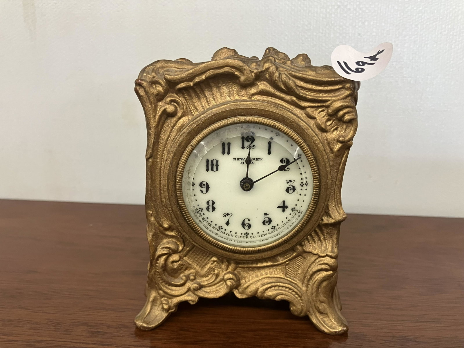 Bronze Art Nouveau New Haven Clock: wind up, porcelain face, bronze, 4"x4".