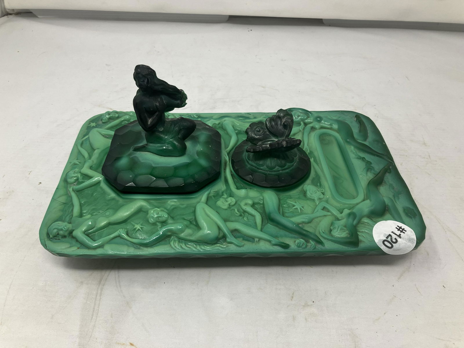 Malachite Desk/Inkwell Set: raised nudes, buttery fly and art nouveau finial on lids. 9"x6".