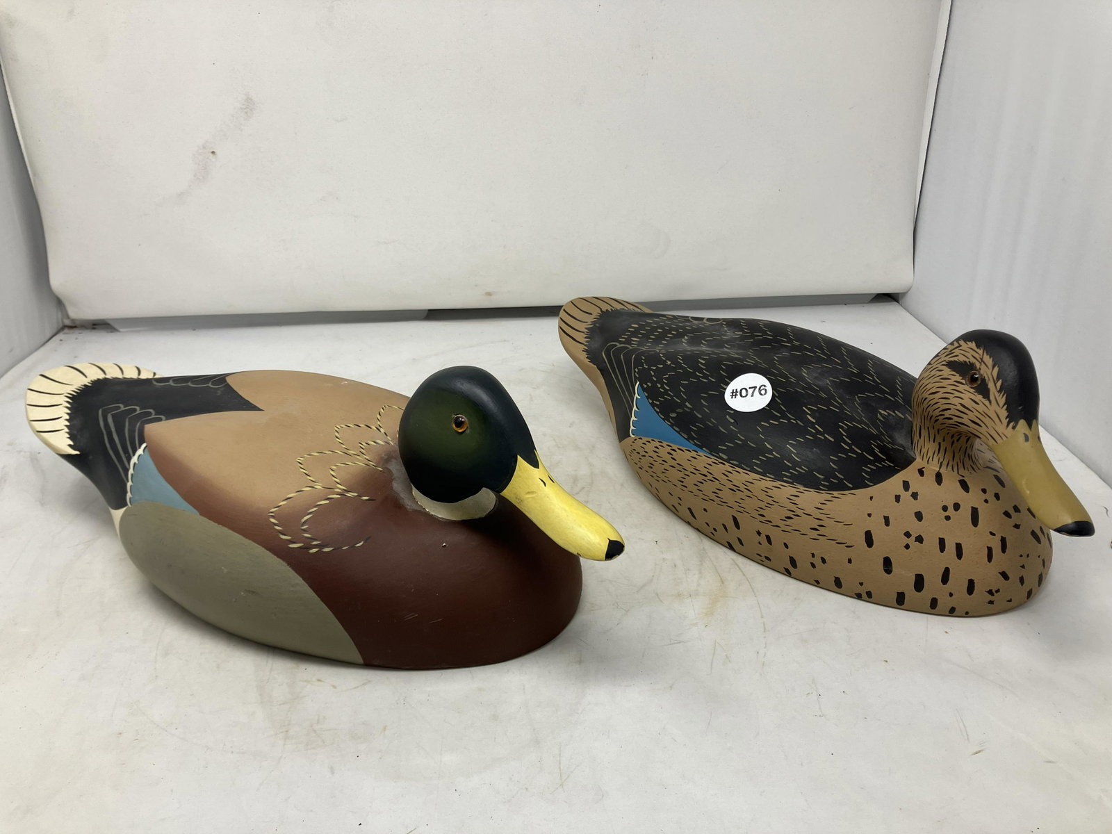 Pair of Quacker Boy Decoys: Measure 15" L. Both signed on base