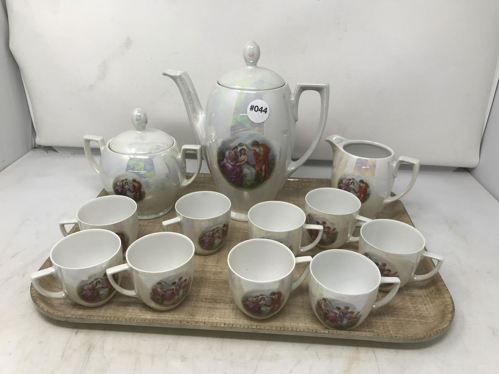 Czechoslovakia Tea Set: Includes a 9" H tea pot, creamer & sugar and nine 2" H cups.