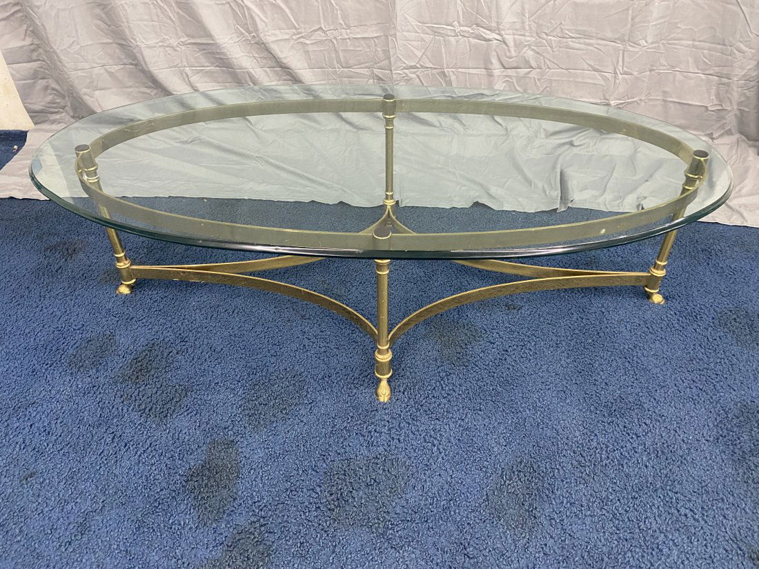 Brass Coffee Table with Glass Top: 16" x 52" x 26". Sits on heavy brass base. **This item is not eligible for in-house shipping.**