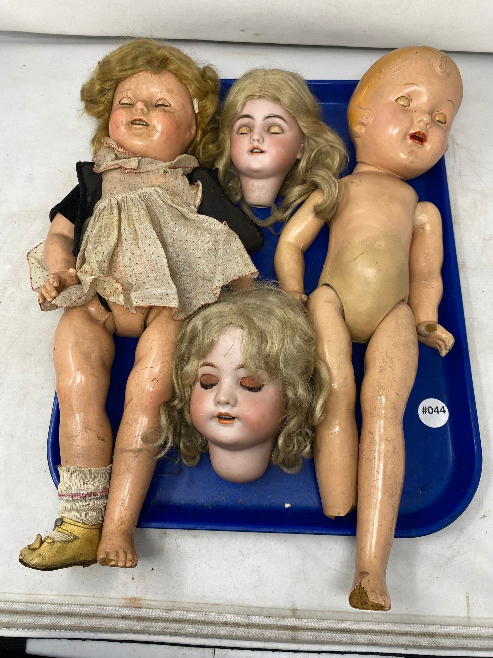 Vintage Dolls: Includes a Shirley Temple doll, Doll head marked Germany. Simon & Helbig.