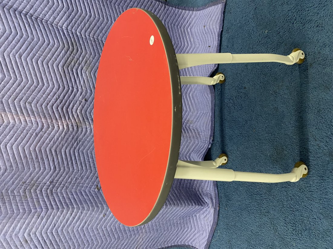 Modern Table: 30"x 30" round, sits on metal legs