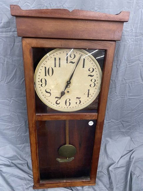 New Haven Regulator Clock: 43" x 17" x 6". Includes pendulum and key