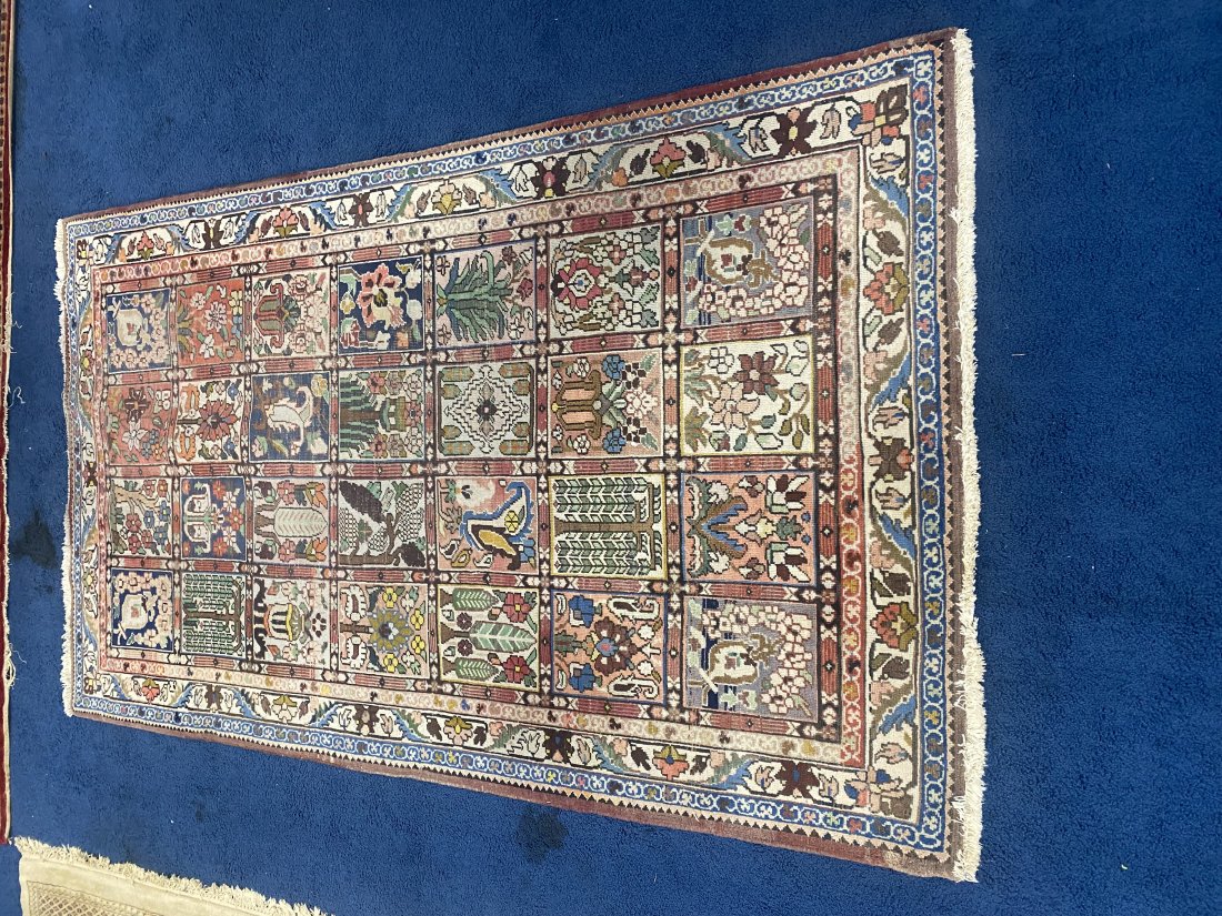 Oriental Area Rug: Hand woven. 61" x 99".