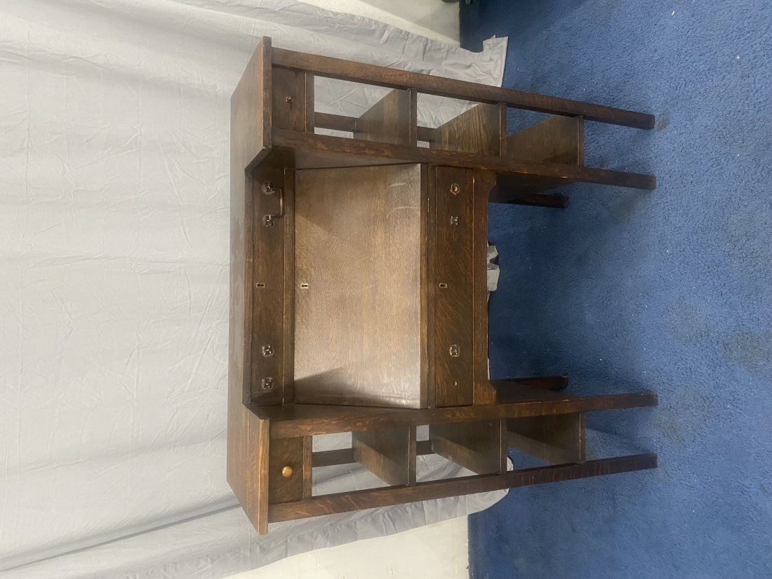 Antique Arts & Crafts Oak Desk: 43" x 40" x 17". Numbered on back, has slant front and original interior
