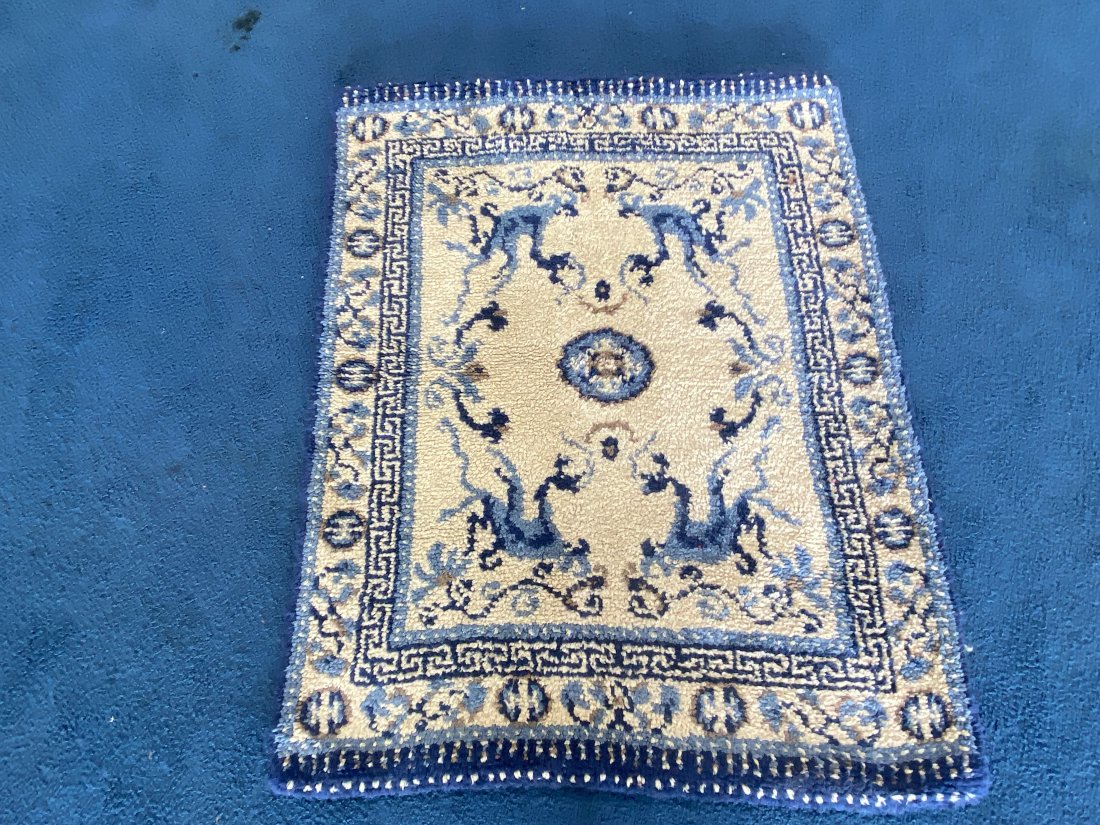 Oriental Carpet: 57" x 43".