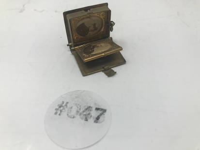 Locket w/ Civil War Photos: 1", has small photos of civil war soilders, made of brass.