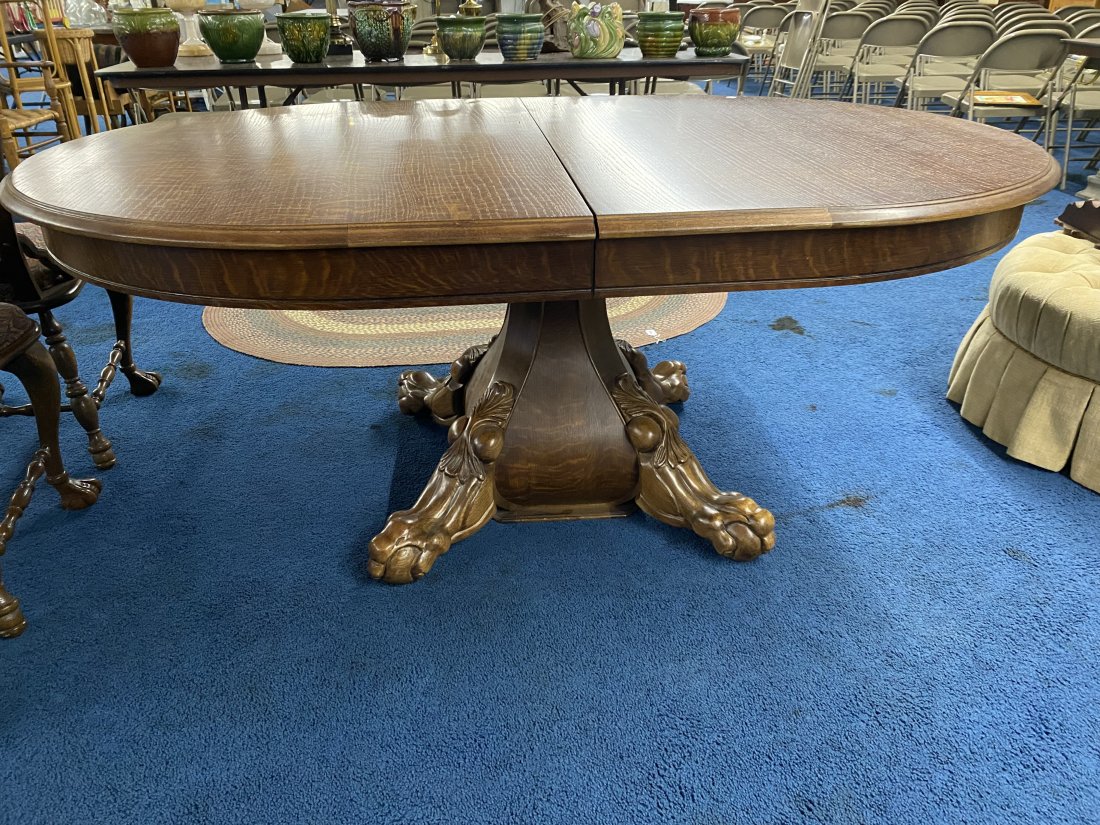 Polaski Oak Dining Table: 31" x 72" x 47", has single 24" board, 2 pieces sits on fancy carved base, signed on underside