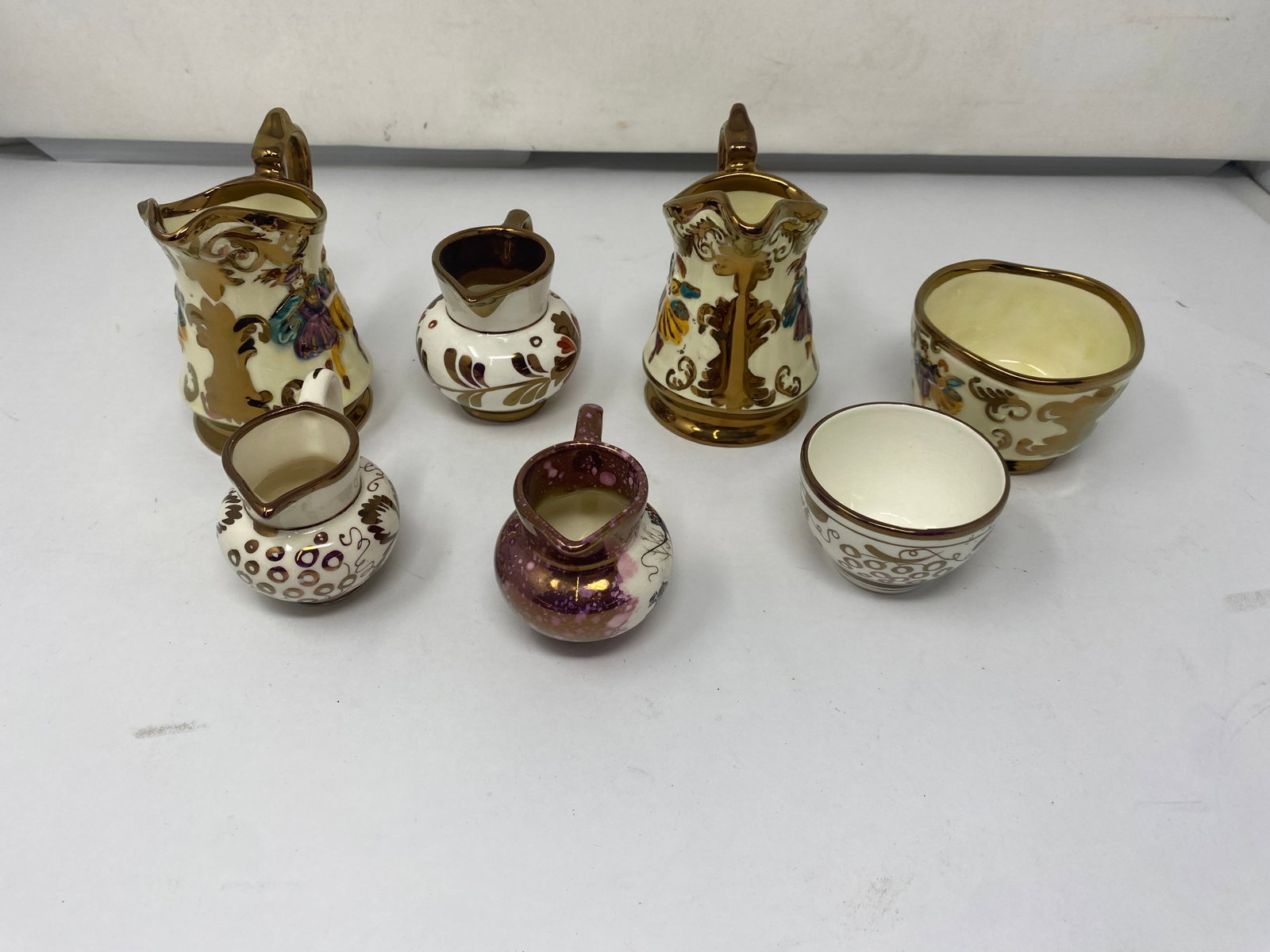 Copper Lustre: creamers are 4"H