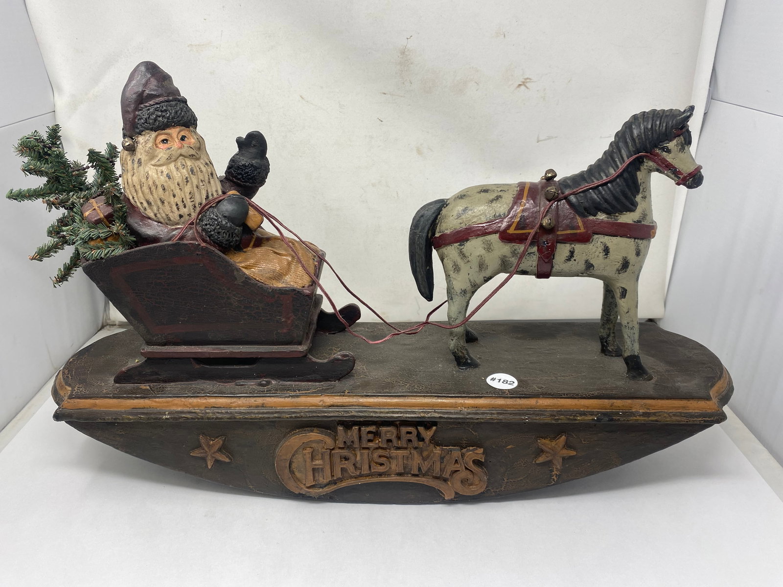 Folk Art Santa on Sleigh: plaster, 24"W.