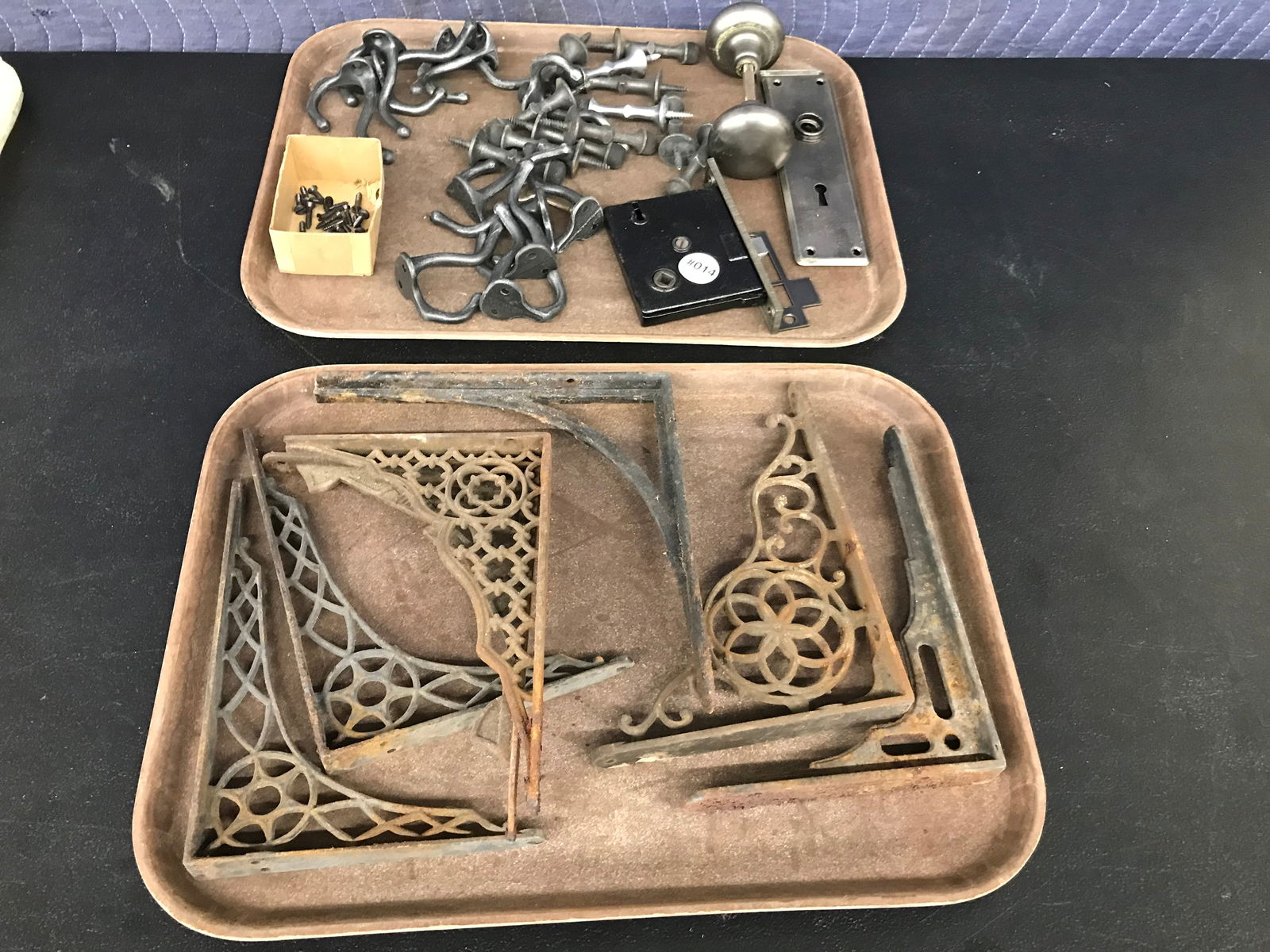 Door Hardware & Iron Brackets: Contemporary door hardware and antique iron brackets.