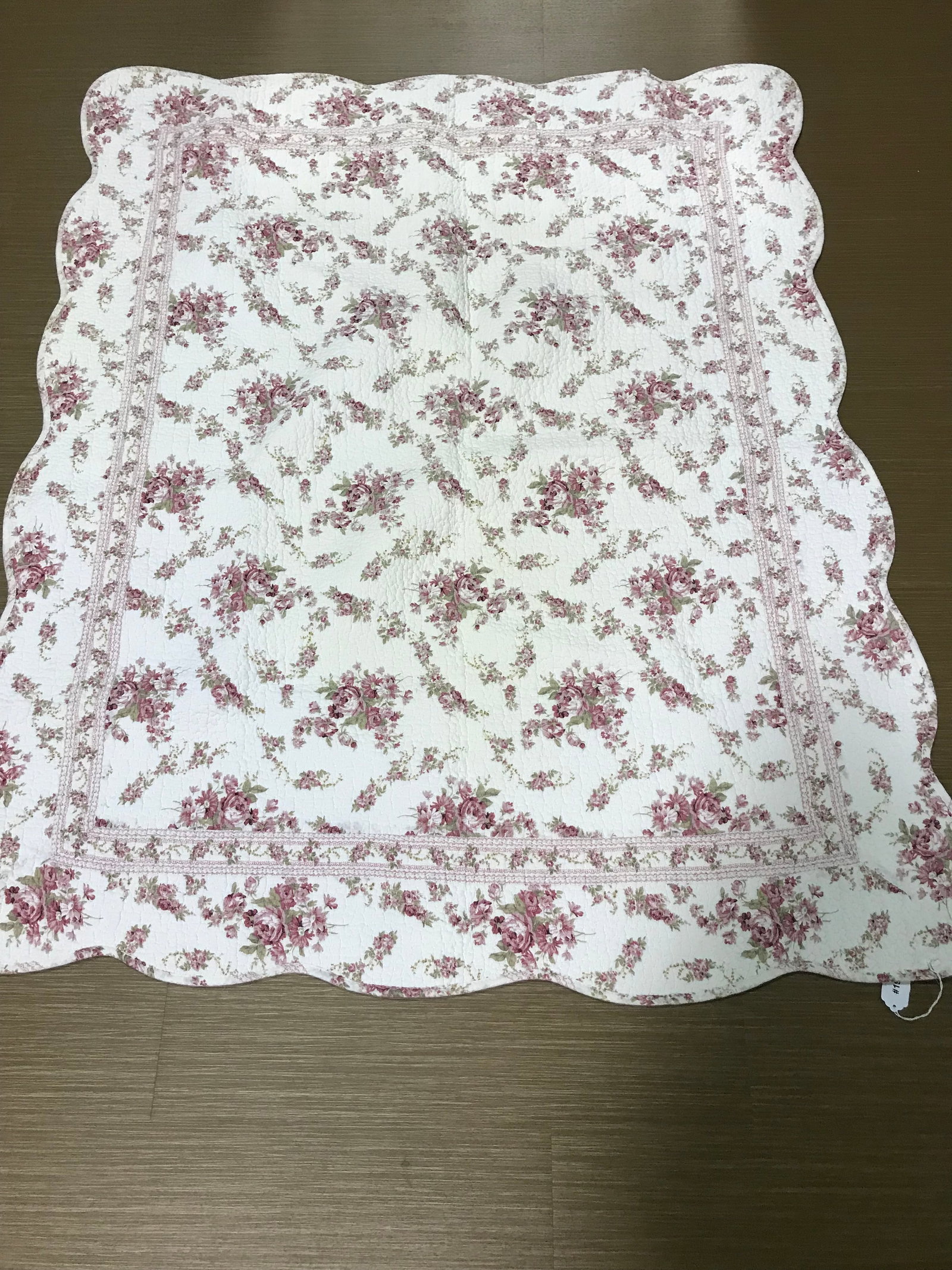 Floral Decorated Quilt: 57" x 46".