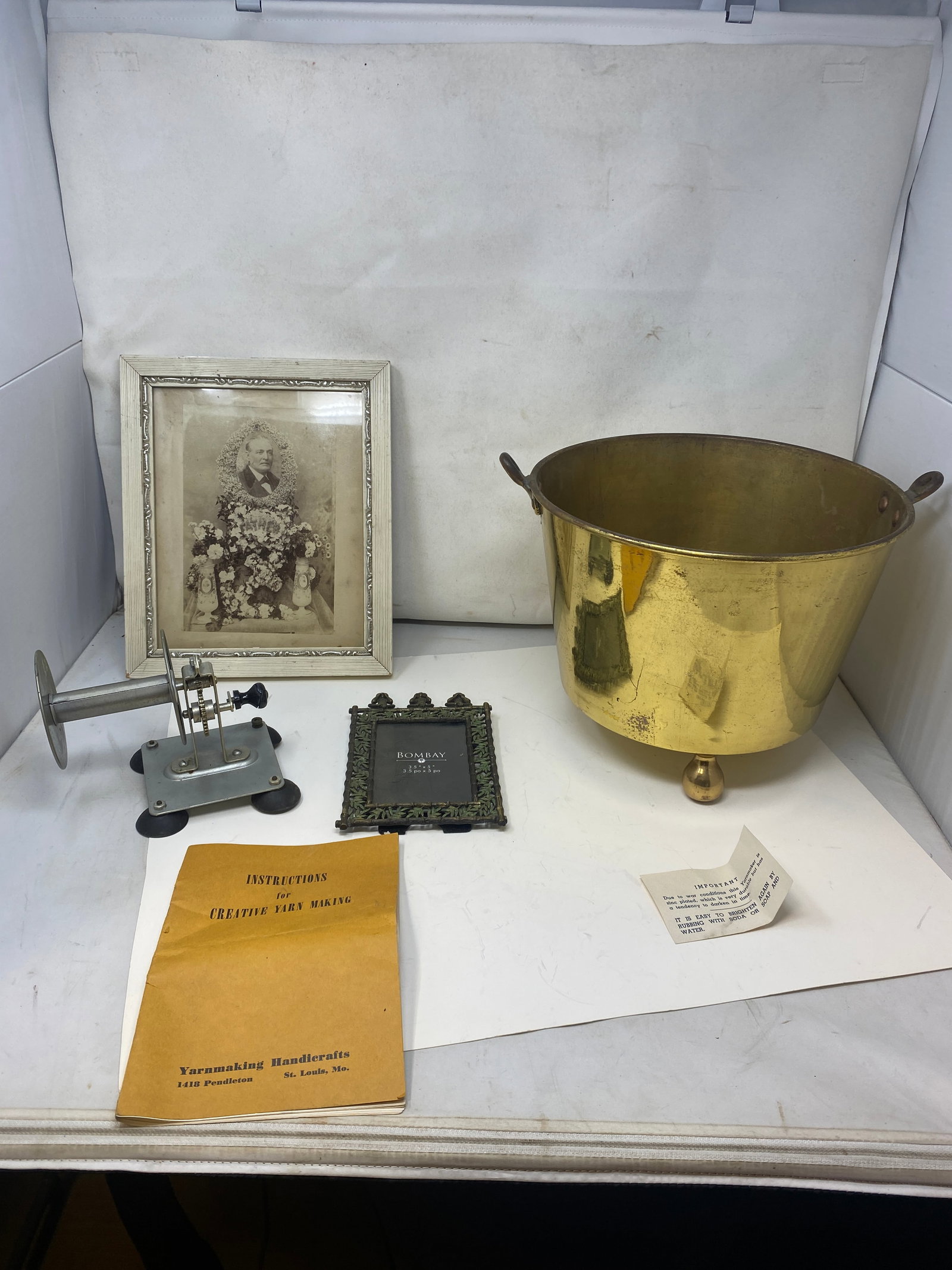 Mixed Lot: Includes 10" x 14" footed brass bucket, picture frames, child's yarn making machine.