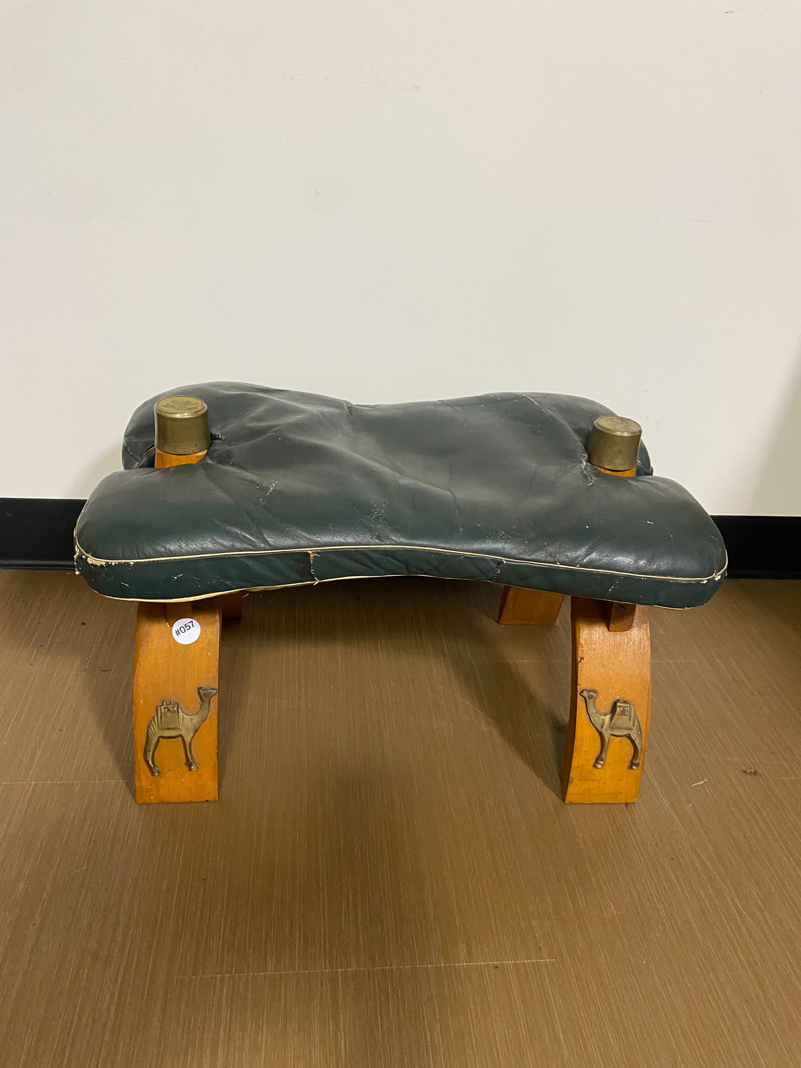 Antique Camel Stool: includes leather cushion, has original bells and brass decorations, 14" x 23" x 15"