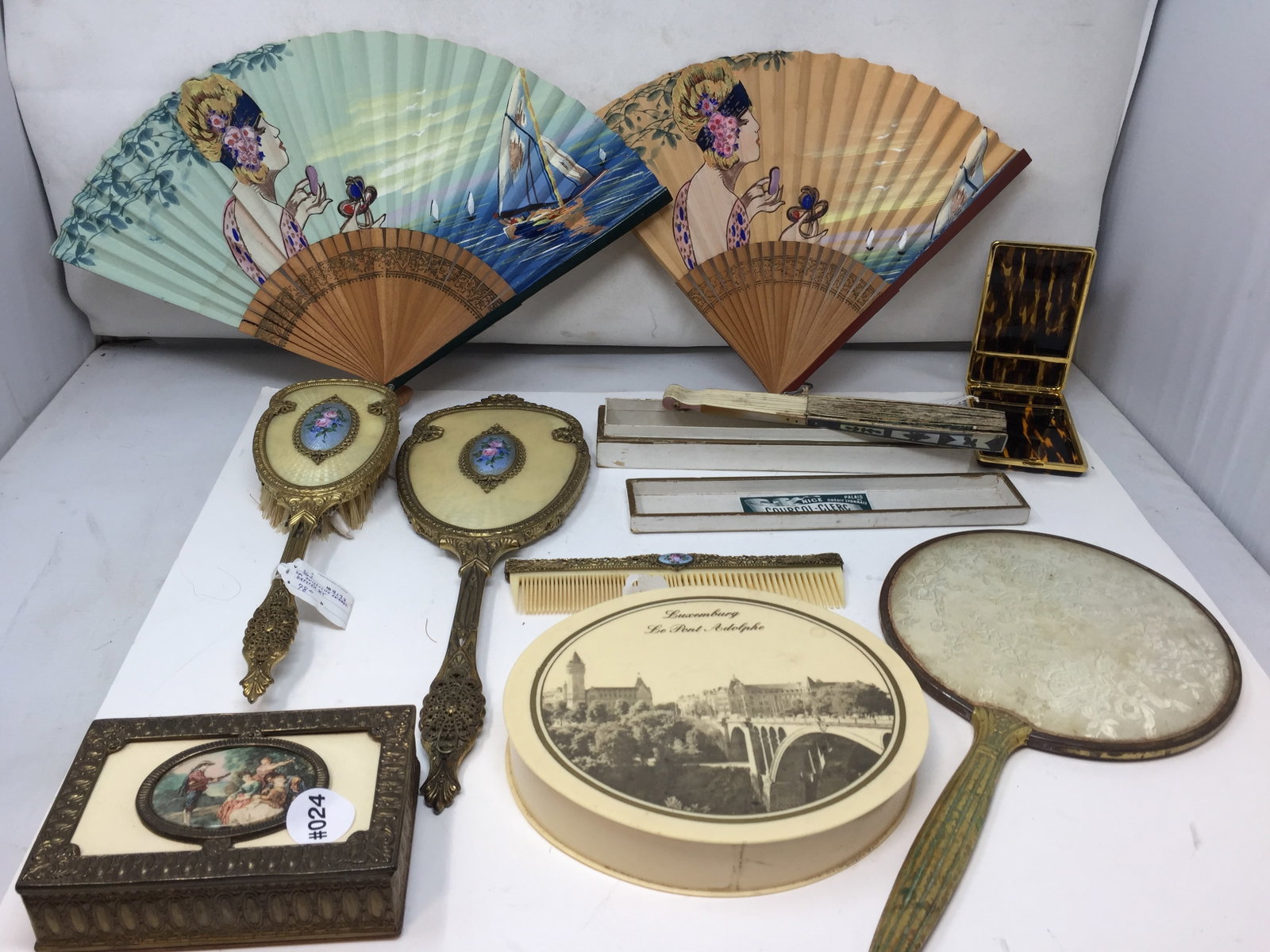 Vintage Dresser Items: Includes mirrors, fans, 8" round box and more.