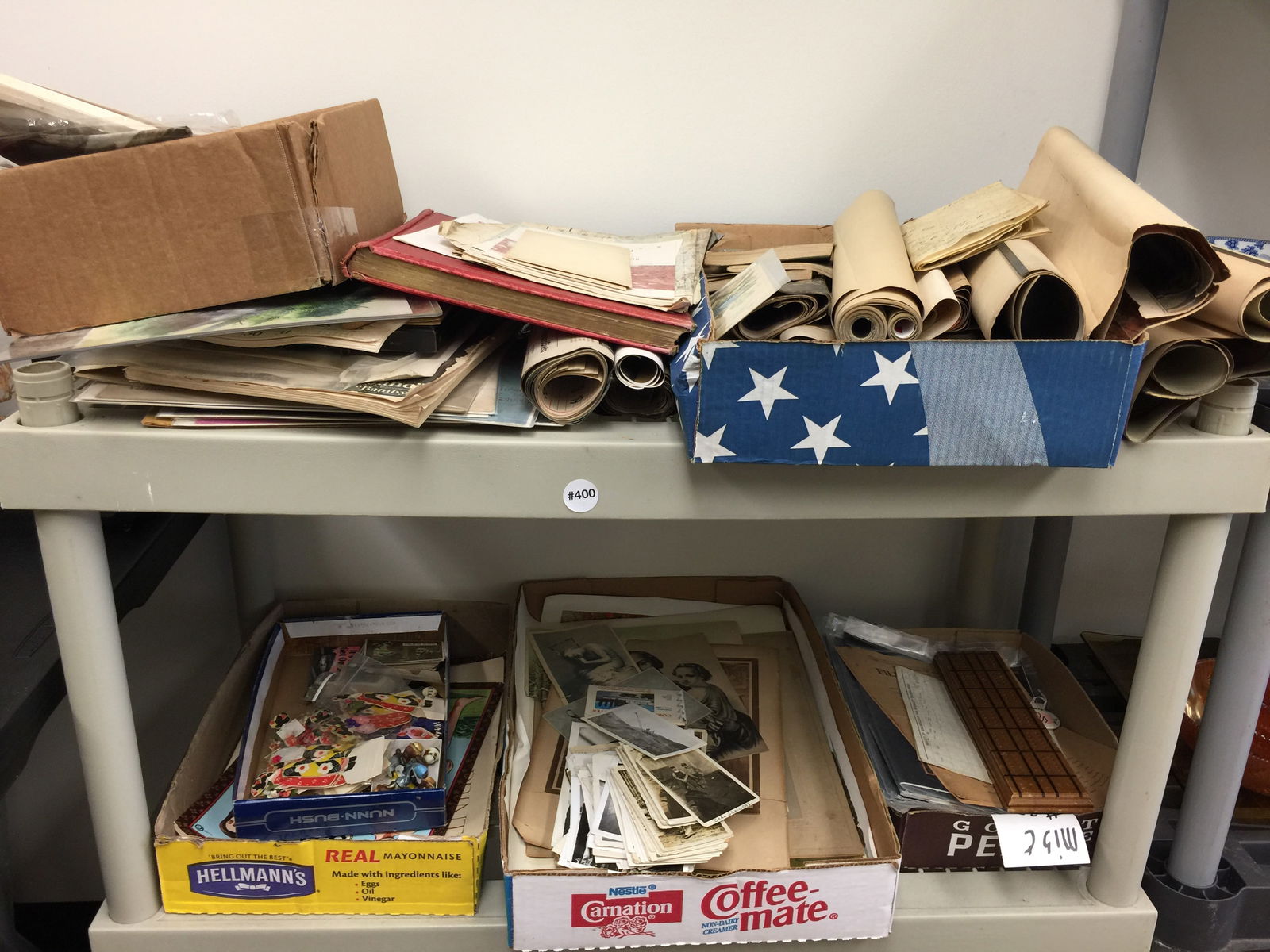 Two Shelves of Paper Goods (1 of 5)