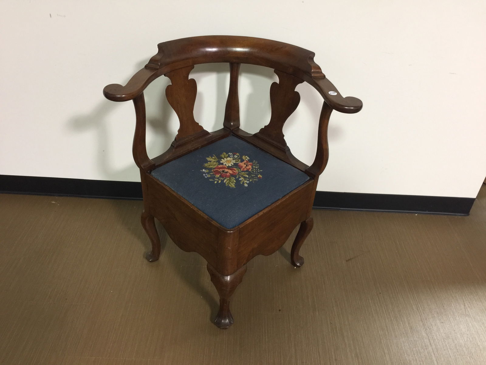 Mahogany Fiddleback Corner Captains Chair: potty chair, needlpoint seat and sits on gabriel paw legs. 30"x25"x32".