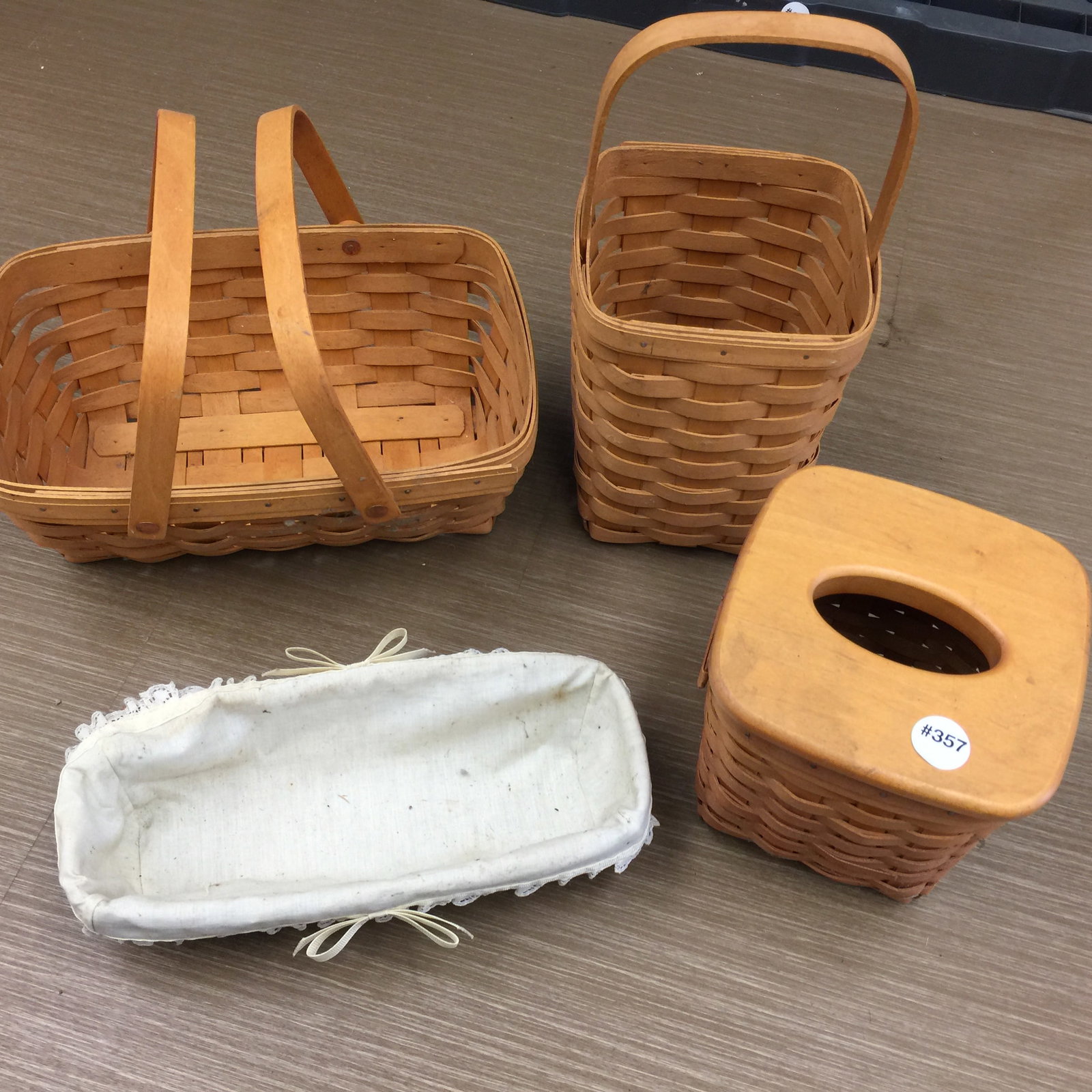 4 Longaberger Baskets: Tallest 13" H, smallest 11" W.