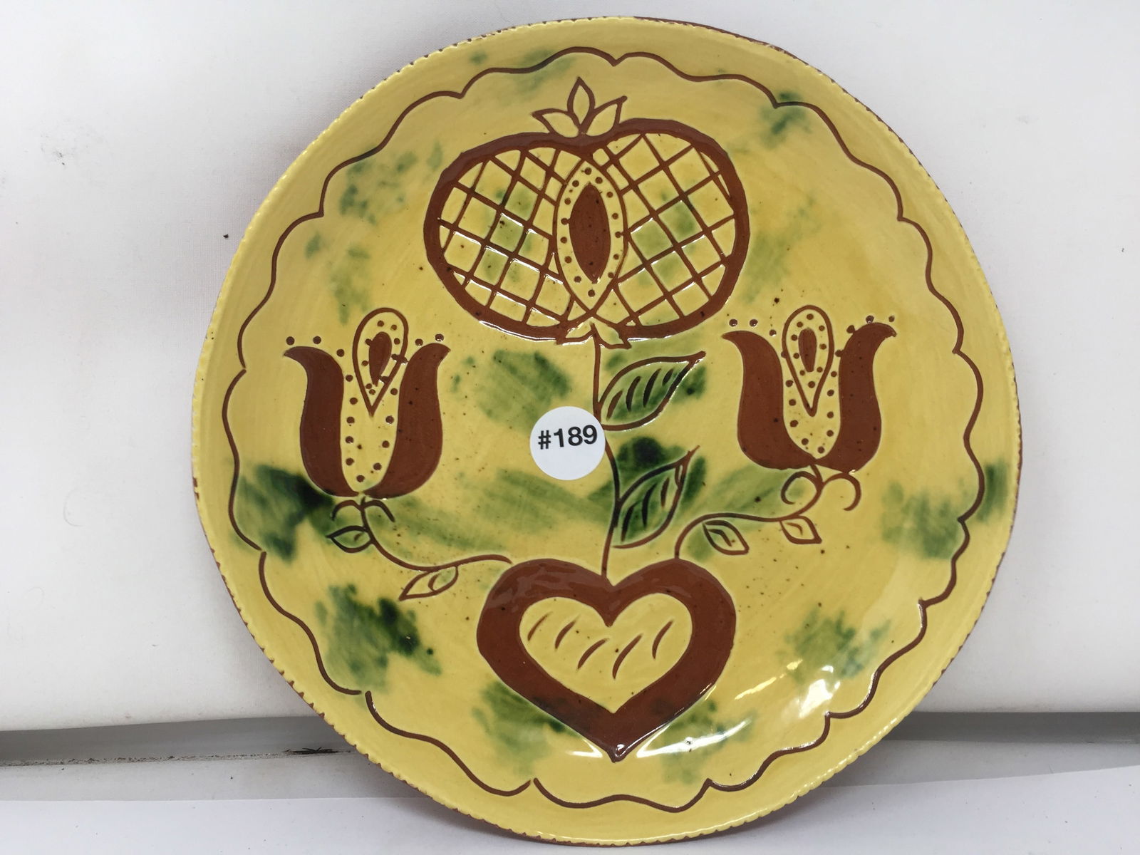 Breninger Redware Plate: marked, 10"W.