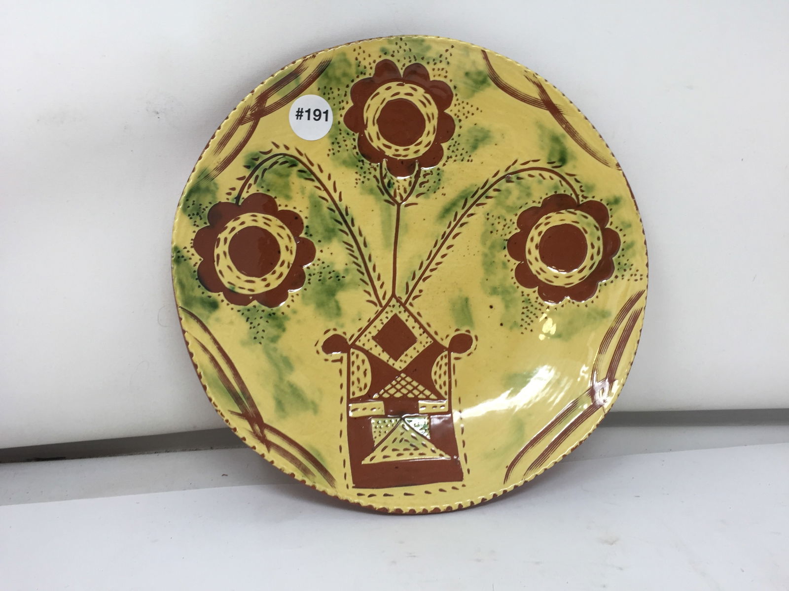 Breninger Redware Plate: marked, 10"W.