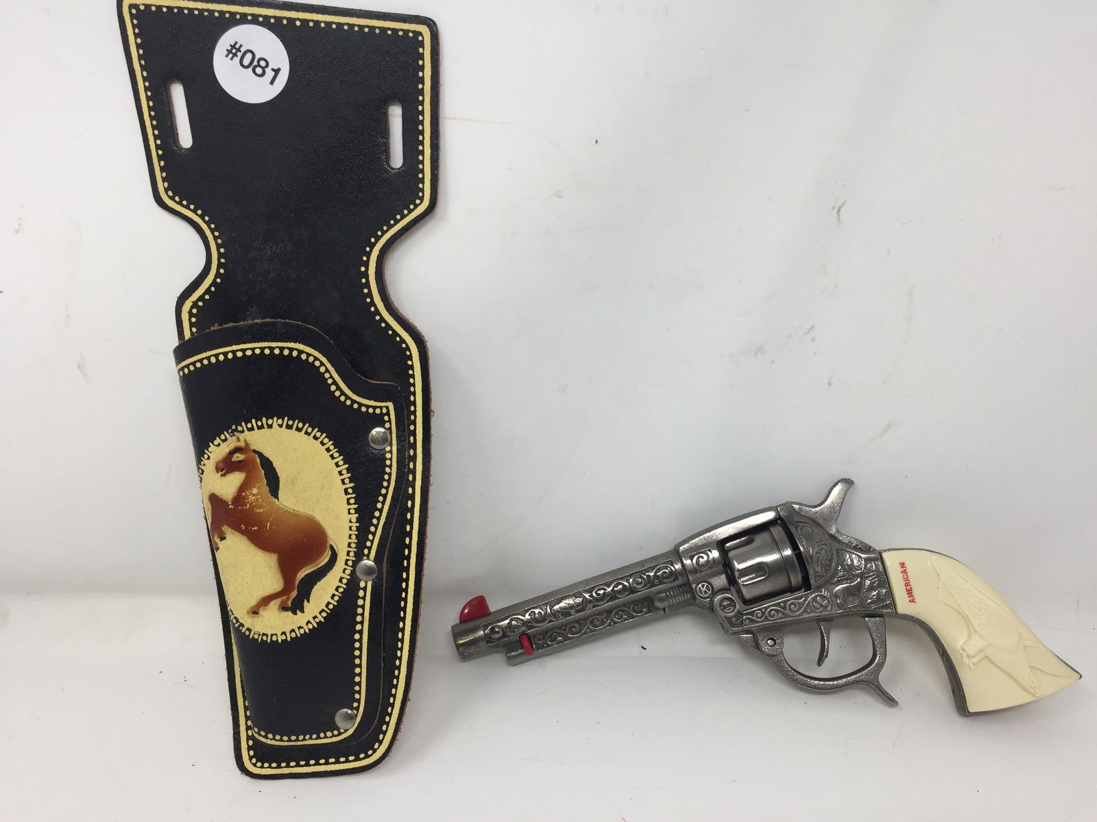 Vintage Kilgore American Cap Gun: includes an 11" holster, gun is 10" x 5"