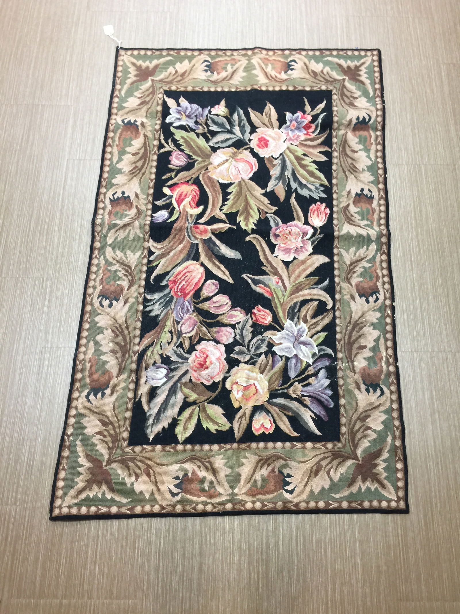 Needlepoint Carpet: 58" x 35".