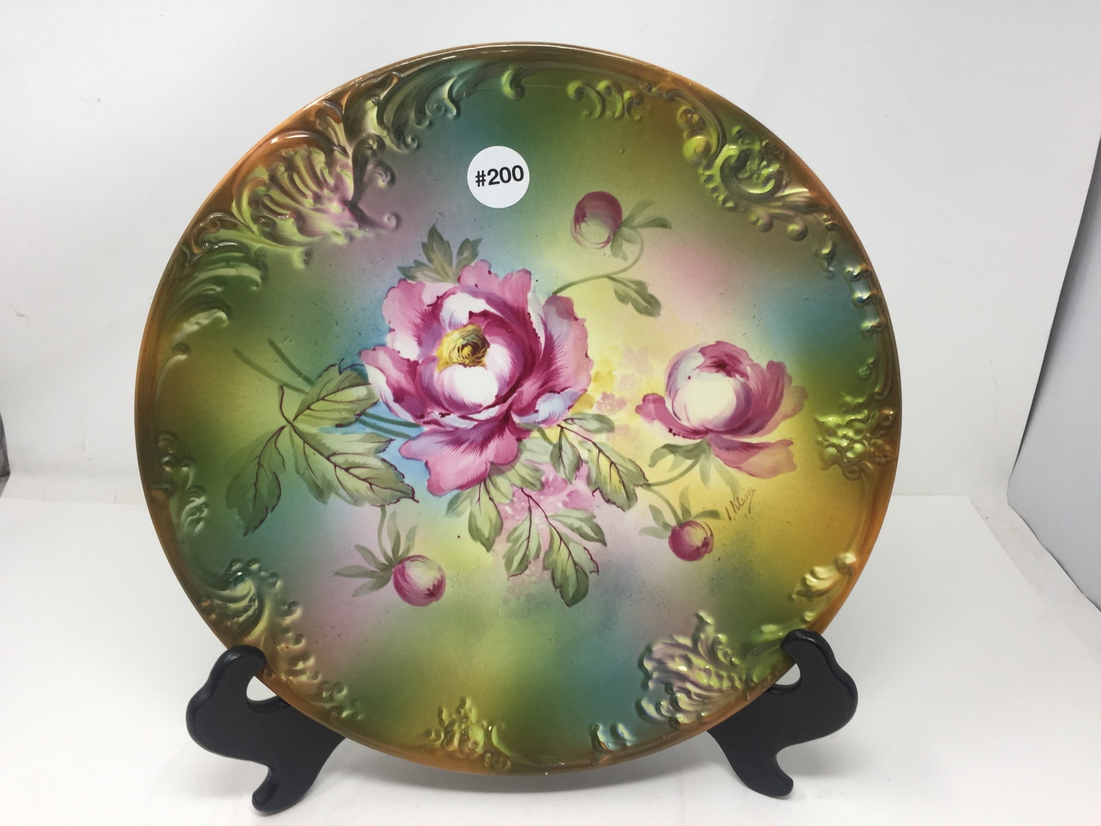 Royal Bonn Artist Signed Charger: Raised relief decoration. Signed I. Klein. 13" W.