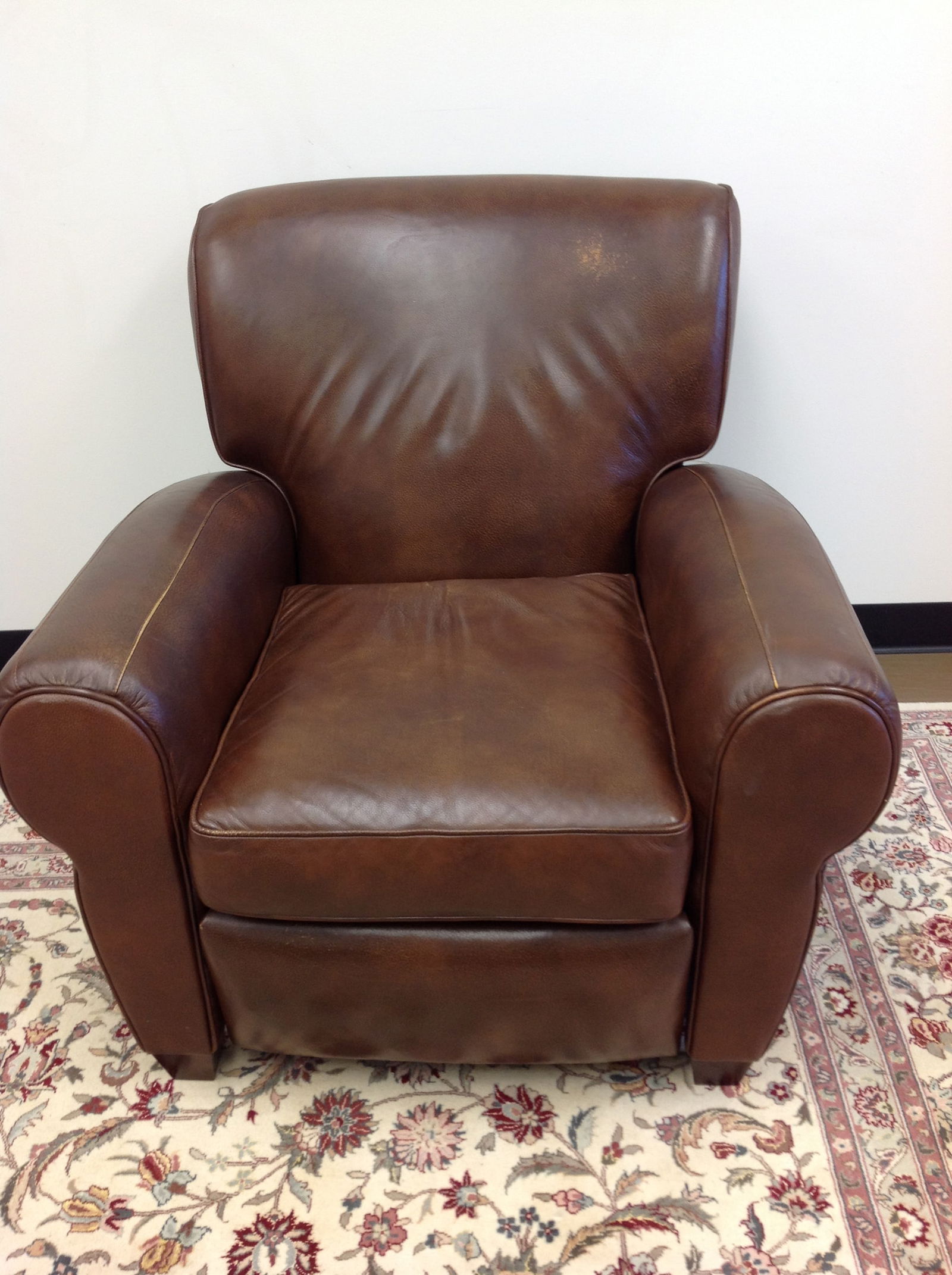 Leather Recliner: 34"x35"x32".