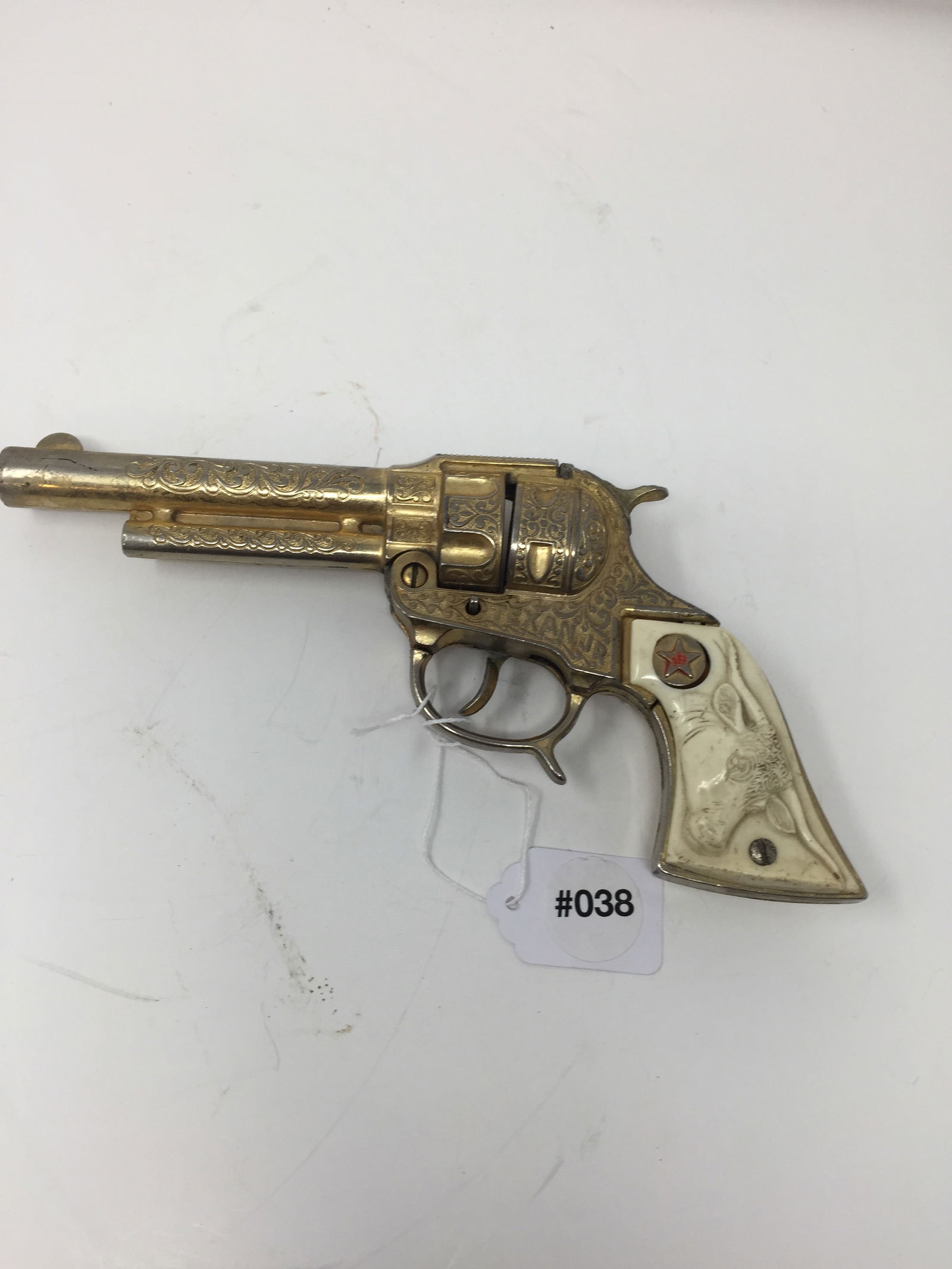 Vintage Texan Jr. Cap Gun: 9" x 4", die cast