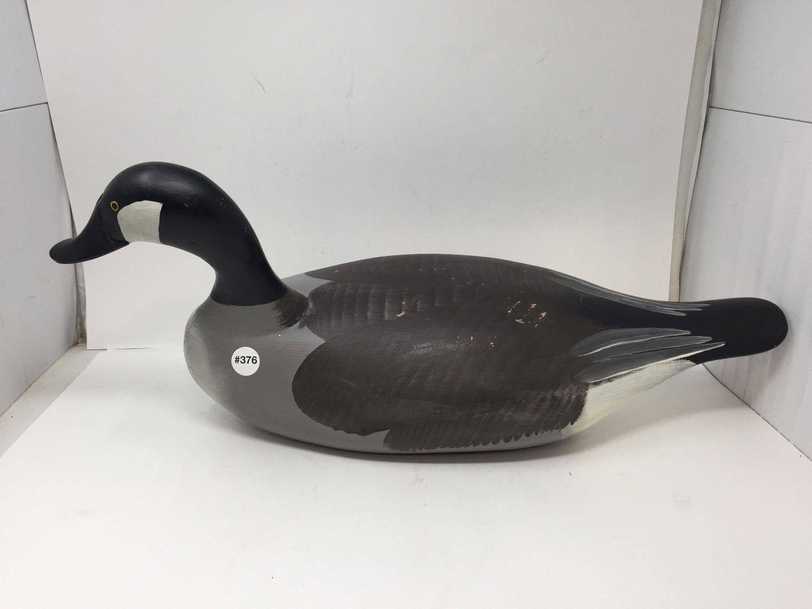 Canadian Goose Decoy: 26" x 10". Wooden, handpainted. Signed on bottom.