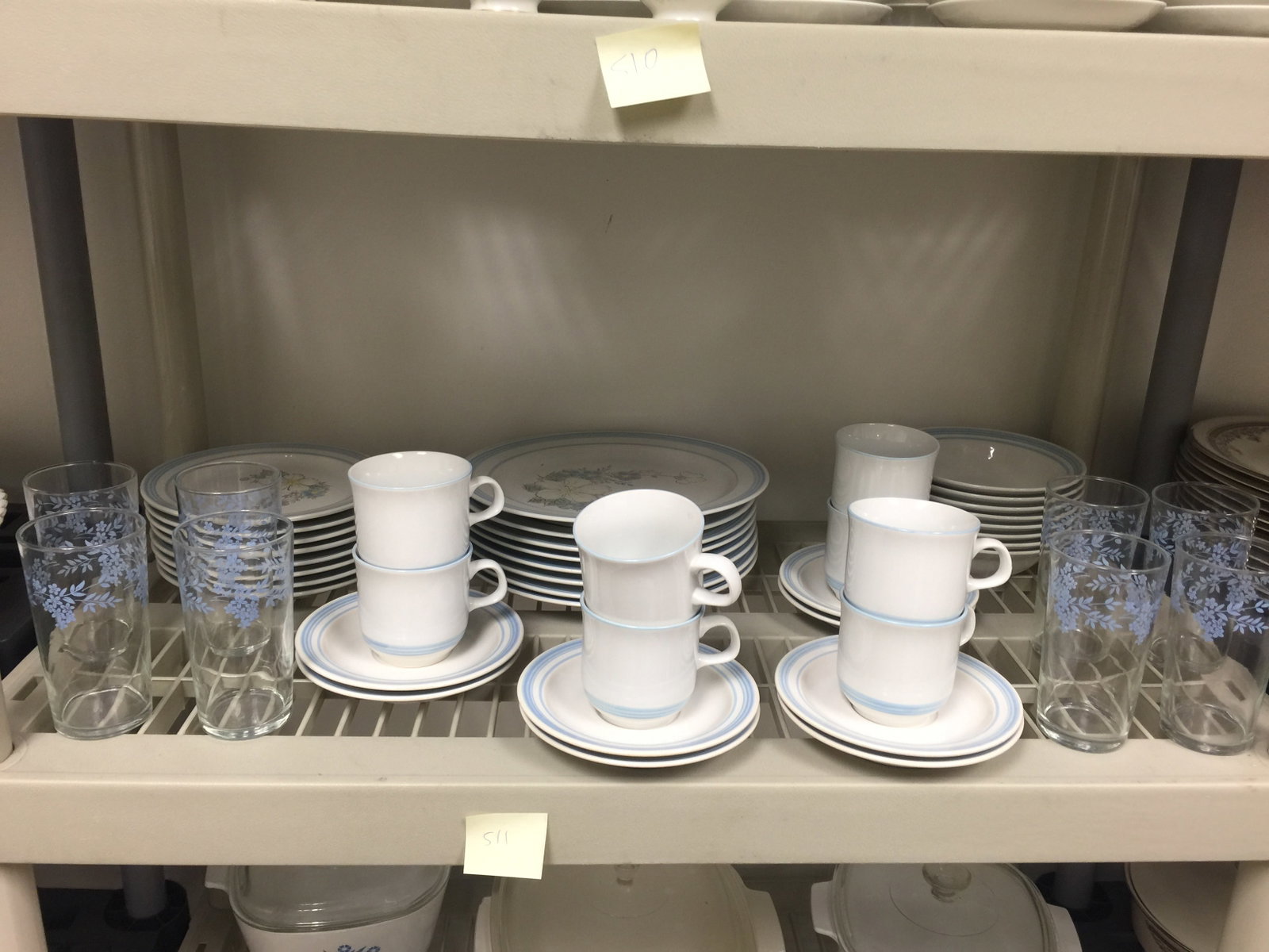 Stoneware China: service for eight plus drinking glasses.