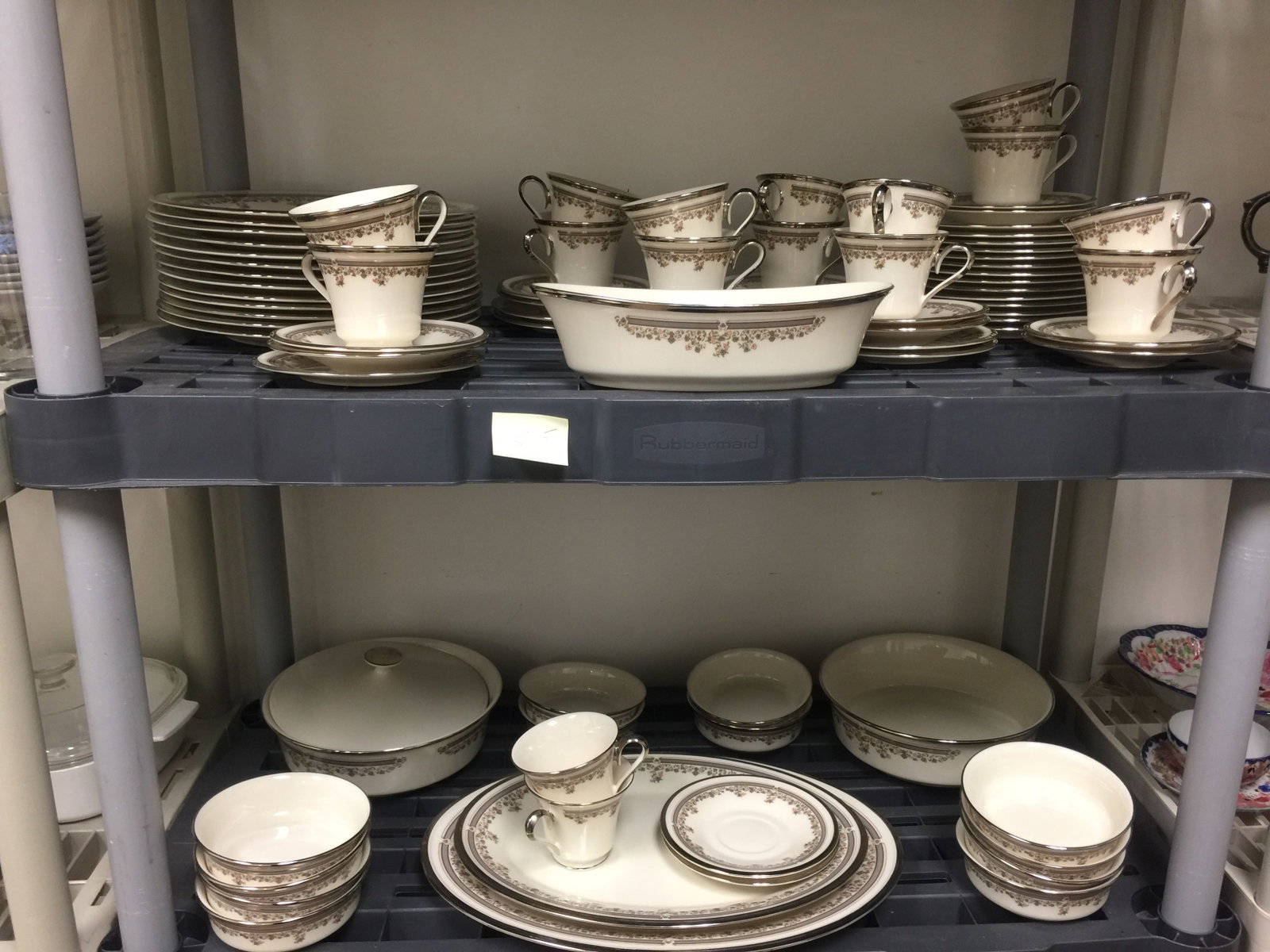 Grouping of Lenox Lace Point: service for twelve with serving pieces.